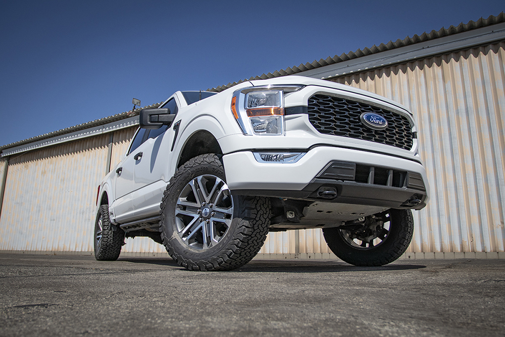 4-01-lifted-white-2022-ford-f150-front-angle-photo-wide-angle
