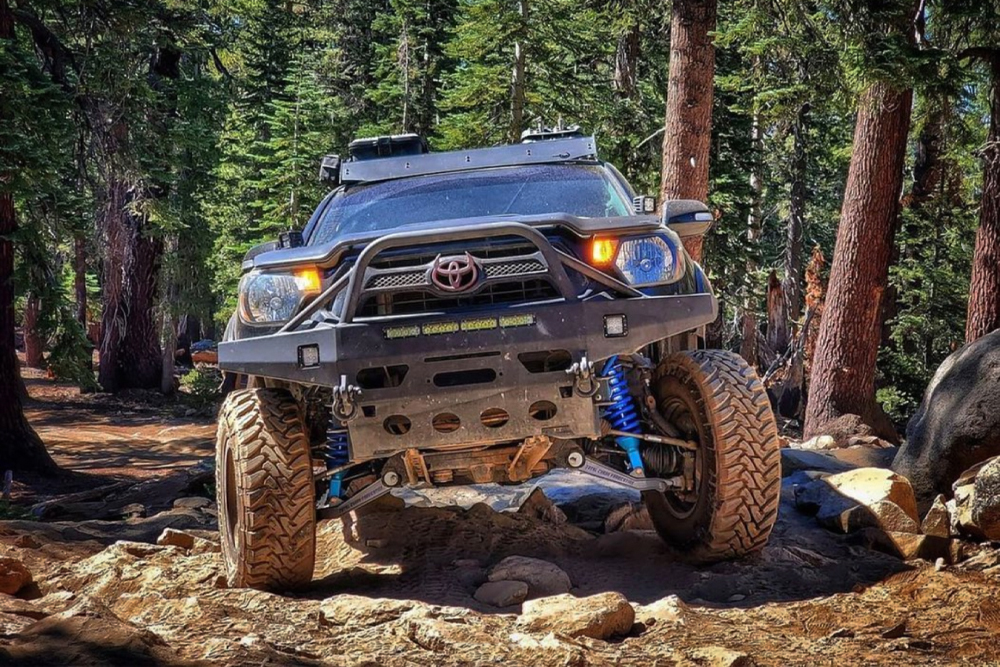 3-01-toyota-tacoma-expedition-series-long-travel-forest-woods