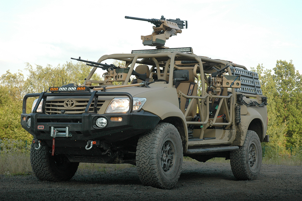 5-01-Toyota-Hilux-Vigo-military-truck-toyotas-of-war-fde-tan-ARB-bumper