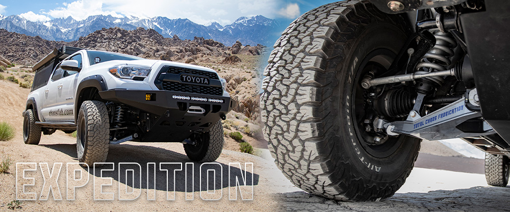 2016 Toyota Tacoma with 2-inch wider per side long travel suspension kit from Total Chaos, built for increased wheel travel and off-road control