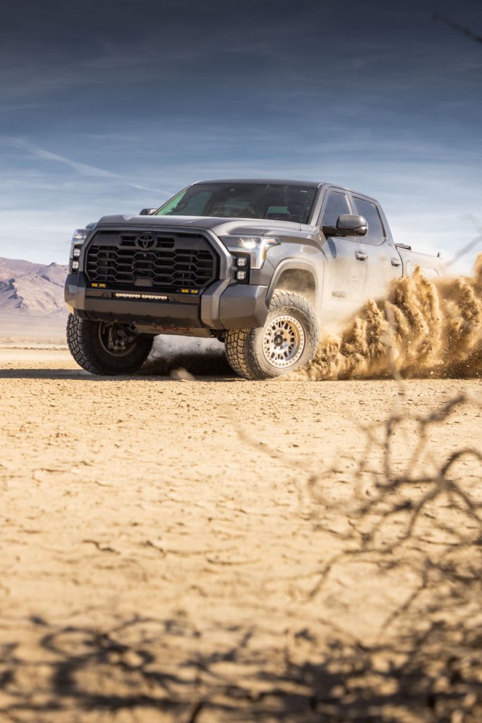 3rd Gen Tundra carving dirt on a dry lake bed with 35 inch tires and TOTAL CHAOS lift kit