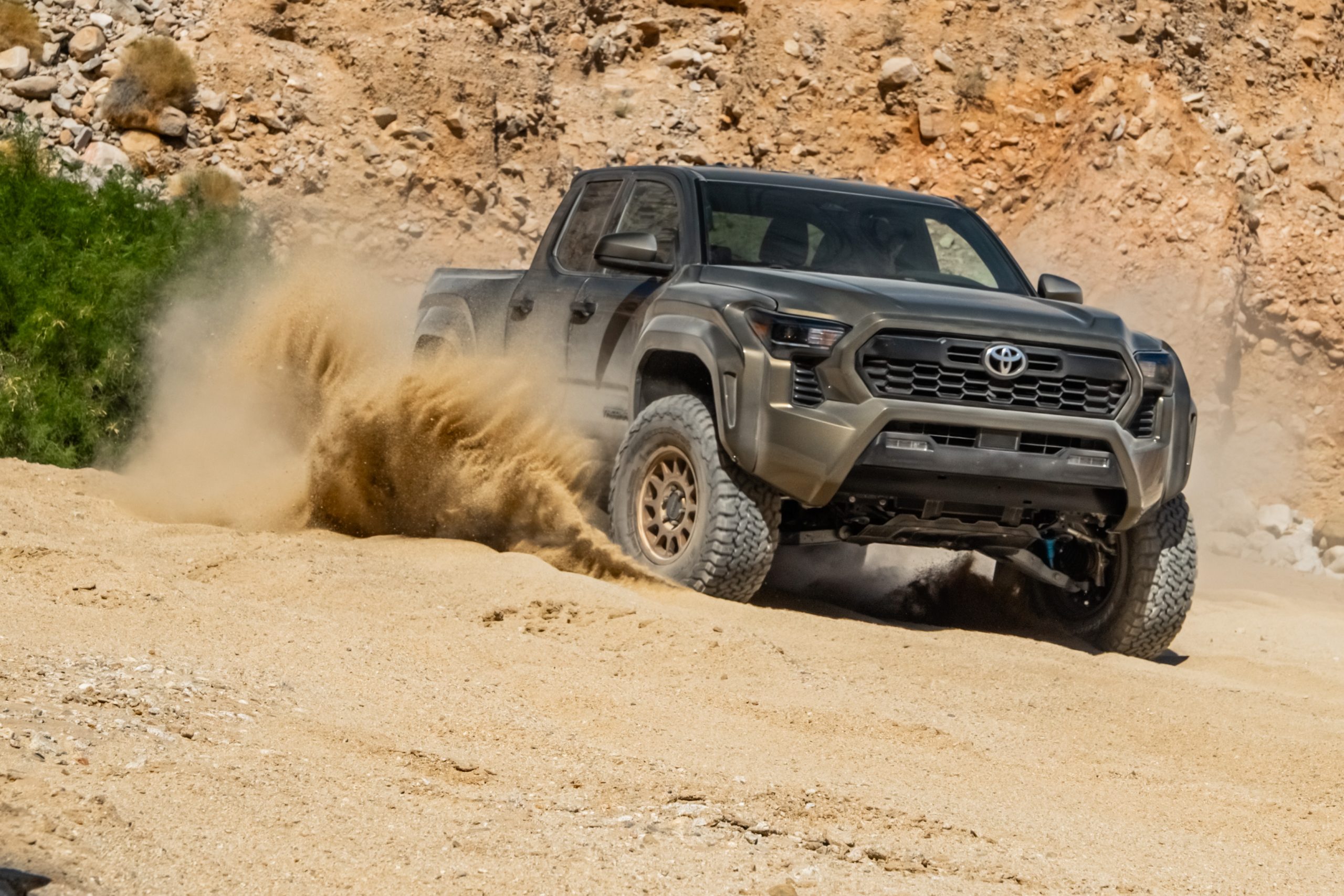 2024 Total Chaos King Shocks Long Travel Tacoma roosting sand in the corner
